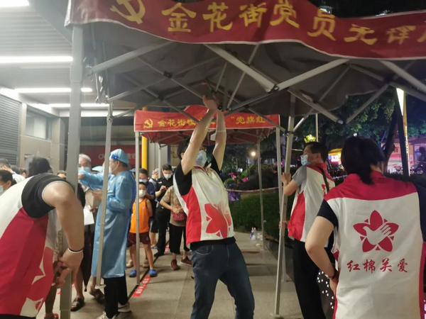 nEO_IMG_p2-无惧高温酷暑暴雨倾盆，广州司法行政人全力支援防疫战疫.jpg