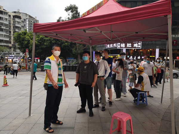 nEO_IMG_p12-无惧高温酷暑暴雨倾盆，广州司法行政人全力支援防疫战疫.jpg